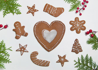 Making heart shaped christmas gingerbread cookies at home. Christmas baking.