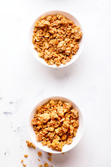 Granola Cereal bar  on light Background . Muesli Breakfast. Healthy Food sweet dessert snack. Diet Nutrition Concept. Vegetarian food. Flat Lay. Copy space