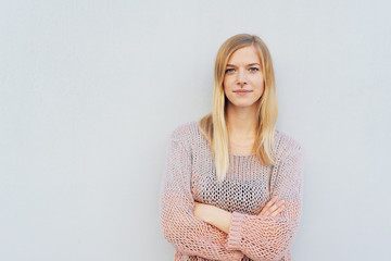 Confident pretty young blond woman