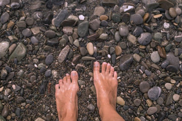 feet on the beach