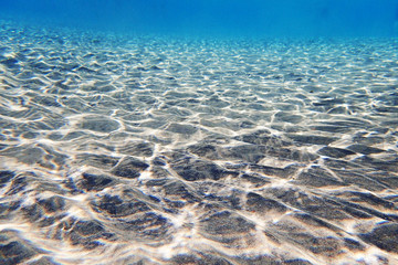 Naklejka premium sea sand waves in water