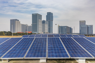 Solar and modern city skyline 