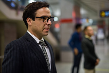 Handsome Persian businessman exploring the city of Bangkok, Thai