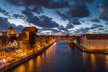 Gdansk aerial view, citylight panorama in the evening with Zuraw and Soldek ship