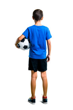 A Full-length Shot Of Boy Playing Soccer In Back Position On Isolated White Background