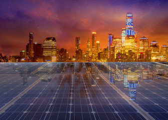 Solar panel over cityscape nightlight background. solar power green energy for life concept 