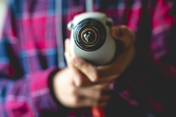close up casual worker holding electric drill and repair furniture at home f