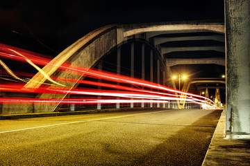 Fototapeta na wymiar Time Exposure bridge car lights laser It information night Mannheim street bulb fast iconic