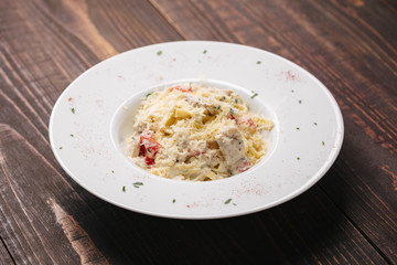 Ham and parmesan salad with tomatoes and сroutons