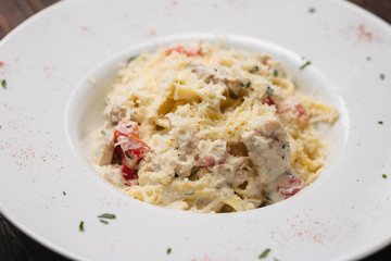 Ham and parmesan salad with tomatoes and сroutons