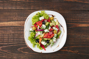 Greek salad on a white plate