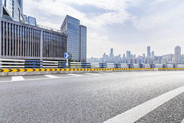 Panoramic skyline and modern business office buildings with empty road,empty concrete square floor