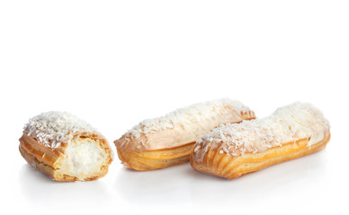 Coconut eclairs isolated on white