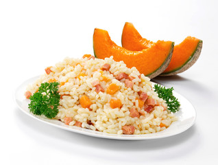Risotto con melone e pancetta