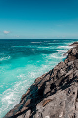 ocean landscape. blue water and rock coasline