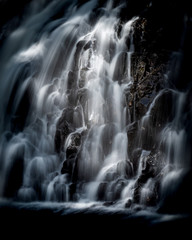 Obraz na płótnie Canvas Cascading water at Rhaeadr Du, Black waterfalls, Snowdonia National Park, Wales