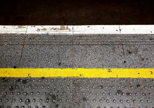 Stand Behind The Yellow Line Warning Sign, London 