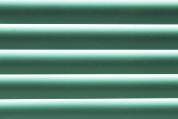Obraz premium Green blinds. Close-up