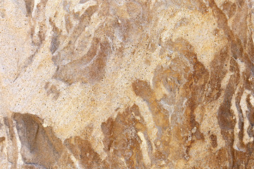 Natural beige brown colorful limestone surface as background texture