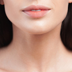 Obraz premium Plump sensual lips of young beautiful woman close up