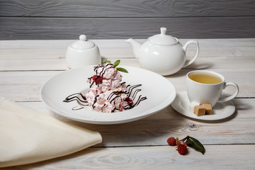 Raspberry pavlova desserts / Sweet meringue delicious dessert with raspberry cream