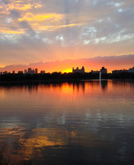 Fototapeta na wymiar Gorgeous sunset at reservoir in Central Park, New York City, NY