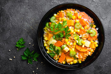 Healthy vegetarian vegetable soup with lentil and vegetables. Lentil soup with vegetables