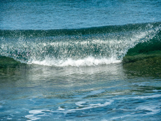 Naklejka premium Small sea waves, Crete island, Greece