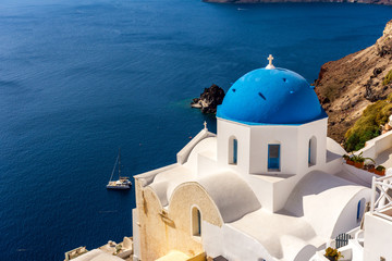 Santorini, Greece. Picturesque view of traditional cycladic Santorini's church on cliff