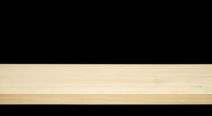 Empty maple table edge on black background including clipping path