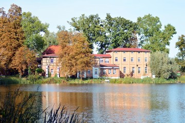 Naklejka na ściany i meble Lake near the park in a medieval city