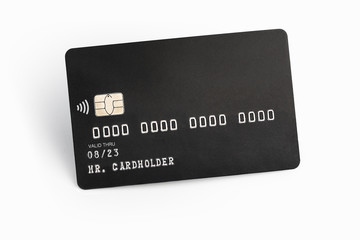 Black credit card on white background with shadow