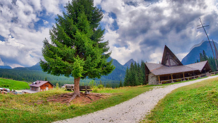 Small church on european alps in summer time