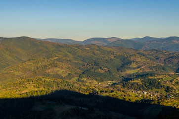 Naklejka na ściany i meble Carpathian mountains in sunny day in the autumn season
