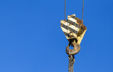 Hook construction crane on blue sky background