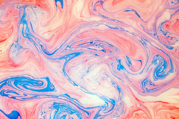 Fototapeta na wymiar Abstract colored marble background. Stains of paint on the water.