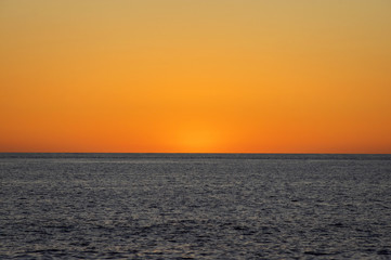 Western Australia – sunset at the Indian Ocean with clear sky at the horizon at a beach at Cape Leveque