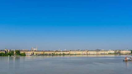 Fototapeta premium BORDEAUX, FRANCE - MAY 18, 2018: View of the city and the river Garonne. Copy space for text.