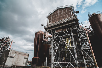 Industrial. Buildings against Cloudy Sky © kimohno