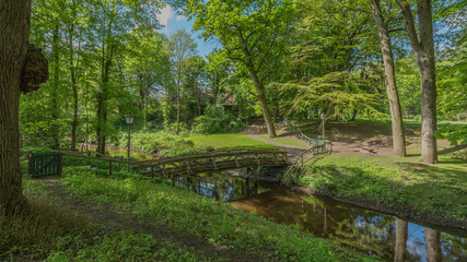 View of the bridge over the river in the monastery Hude, Oldenburg, Germany.
