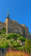 Obraz premium View of Mont Saint Michel, Normandy, France. Copy space for text. Vertical.