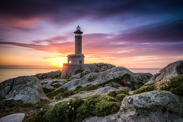 After sunset of The lighthouse of Punta Nariga Malpica in Galicia Spain © onurcepheli
