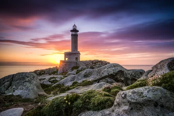 Foto auf Acrylglas After sunset of The lighthouse of Punta Nariga Malpica in Galicia Spain © onurcepheli