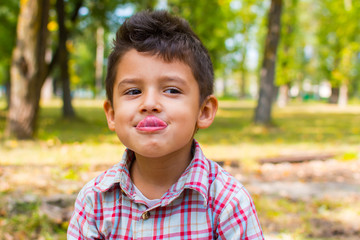 boy is fooling around in the open air