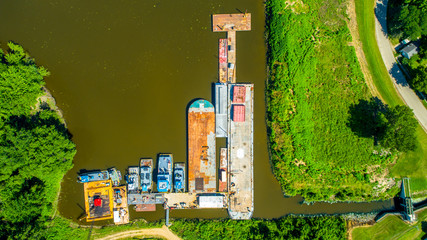 Barges in port along Muddy Mississippi River