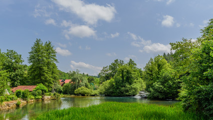 Rastoke village in green nature on Korana river, Croatia. Copy space for text.
