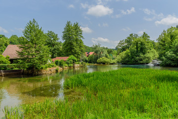 Rastoke village in green nature on Korana river, Croatia. Copy space for text.