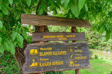 Information board with pictograms on the river Korana, Croatia.