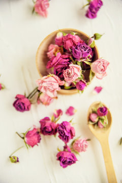 Dried rose petals: for tea, alternative medicine, pot-pourri. Copy space.