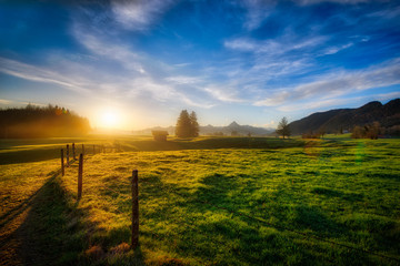 Sunrise in the mountains of Allgau, villages in Bavaria Germany Europe